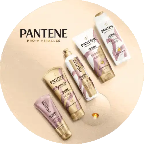 Display of several packages of different kinds of Pantene conditioner & Woman shown from the back applying Pantene conditioner to her long hair 
