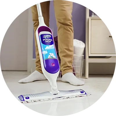 Swiffer PowerMop being used to clean a hard floor surface.