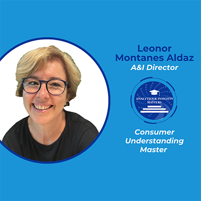 Leanor Montanes Aldaz smiles at the camera wearing a black shirt and glasses   To her right is the A&I Masters logo along with her name and title as an A&I Director; Consumer Understanding Master