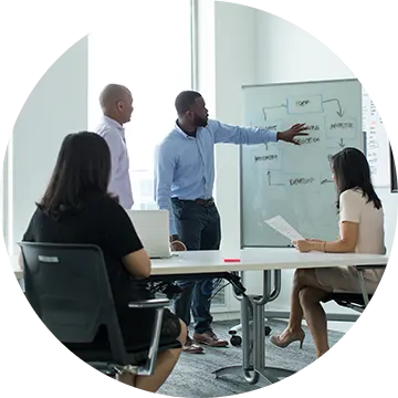 People in the office discussing