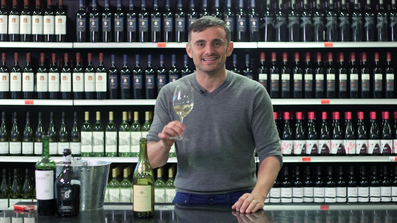 A picture of Vaynerchuk with a glass of wine.