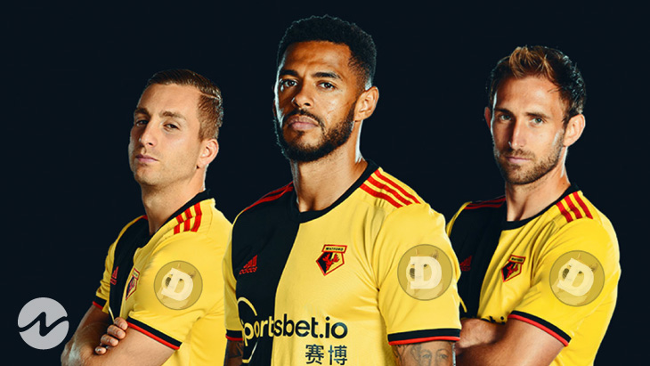 An image of English Premier League side Watford FC players with the Dogecoin logo on their sleeves.