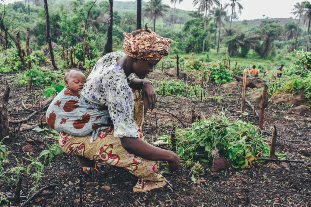 A picture of a rural woman with her child. 