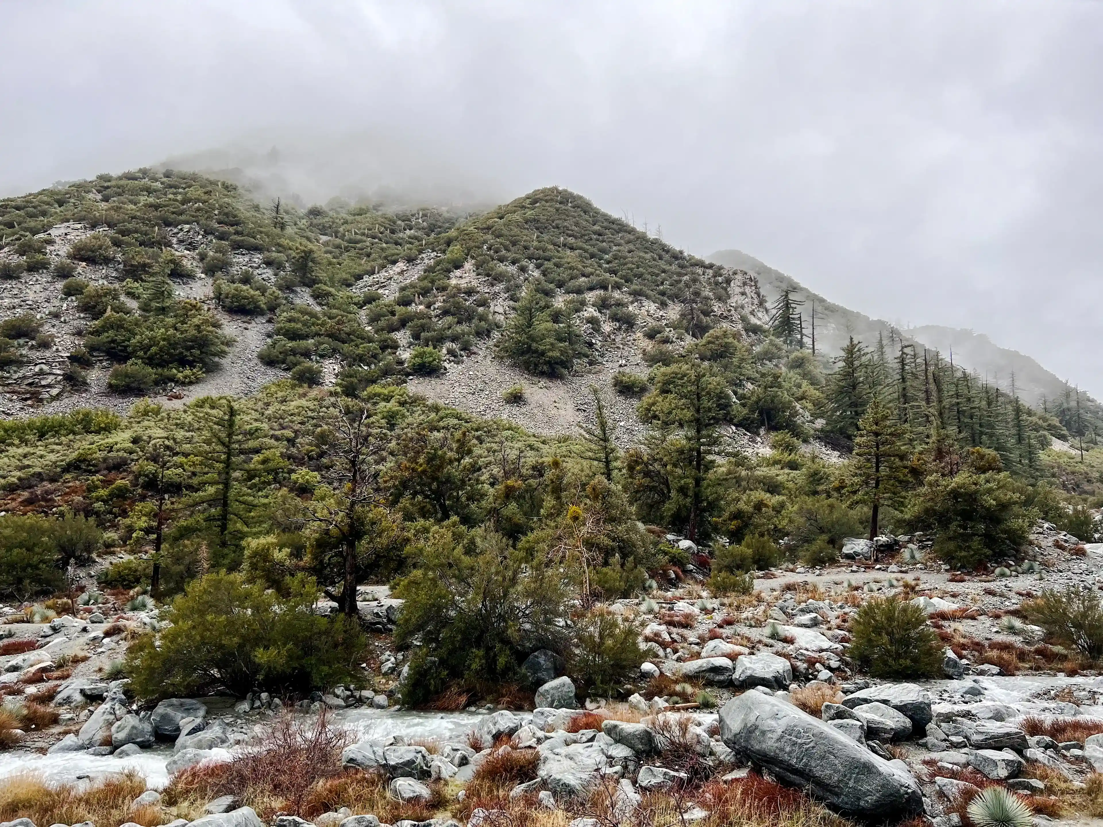 San Antonio Falls - top of the mountains covered in fog
