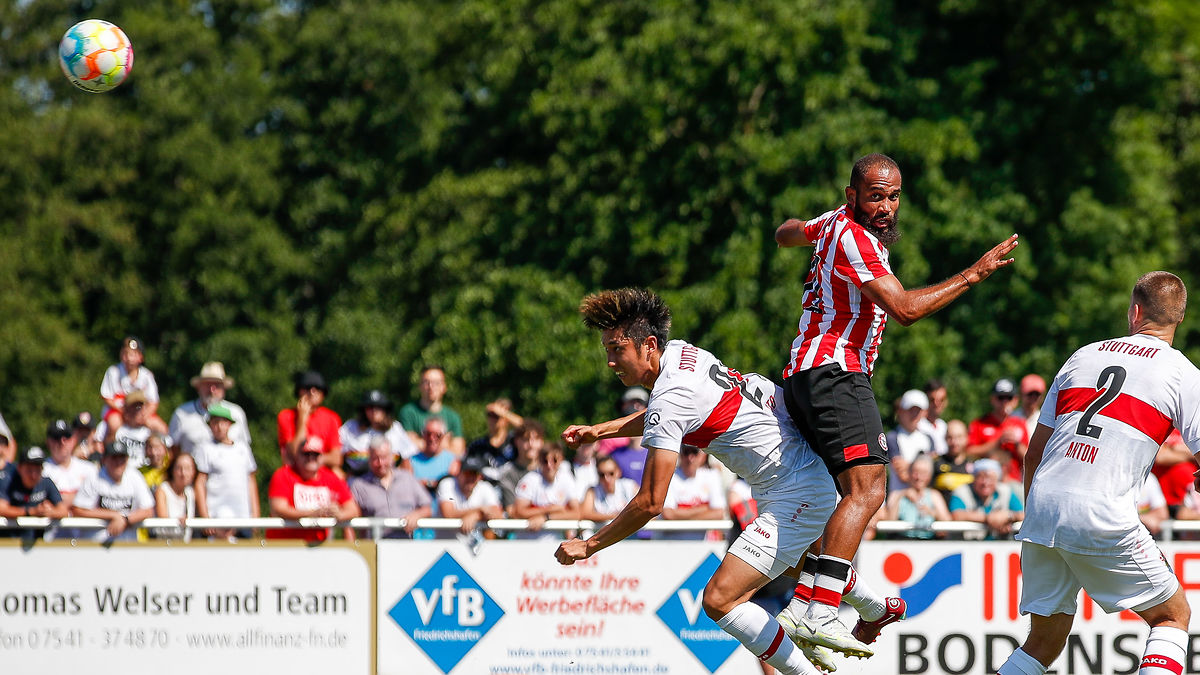 Bryan Mbeumo heads beyond a Stuttgart defender