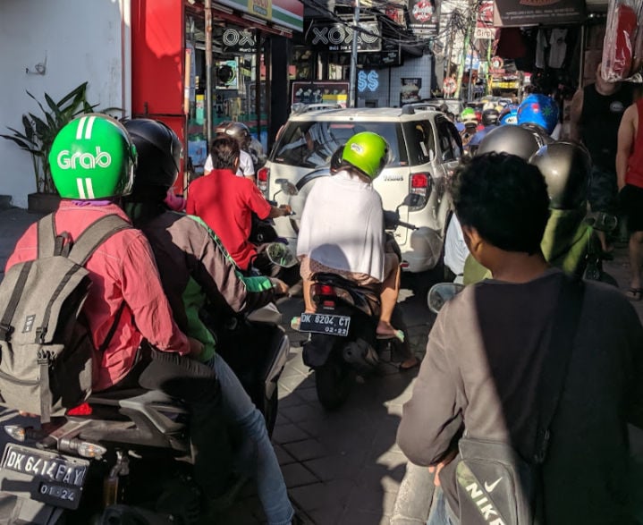 Bali Traffic, bikes are on the sidewalks too