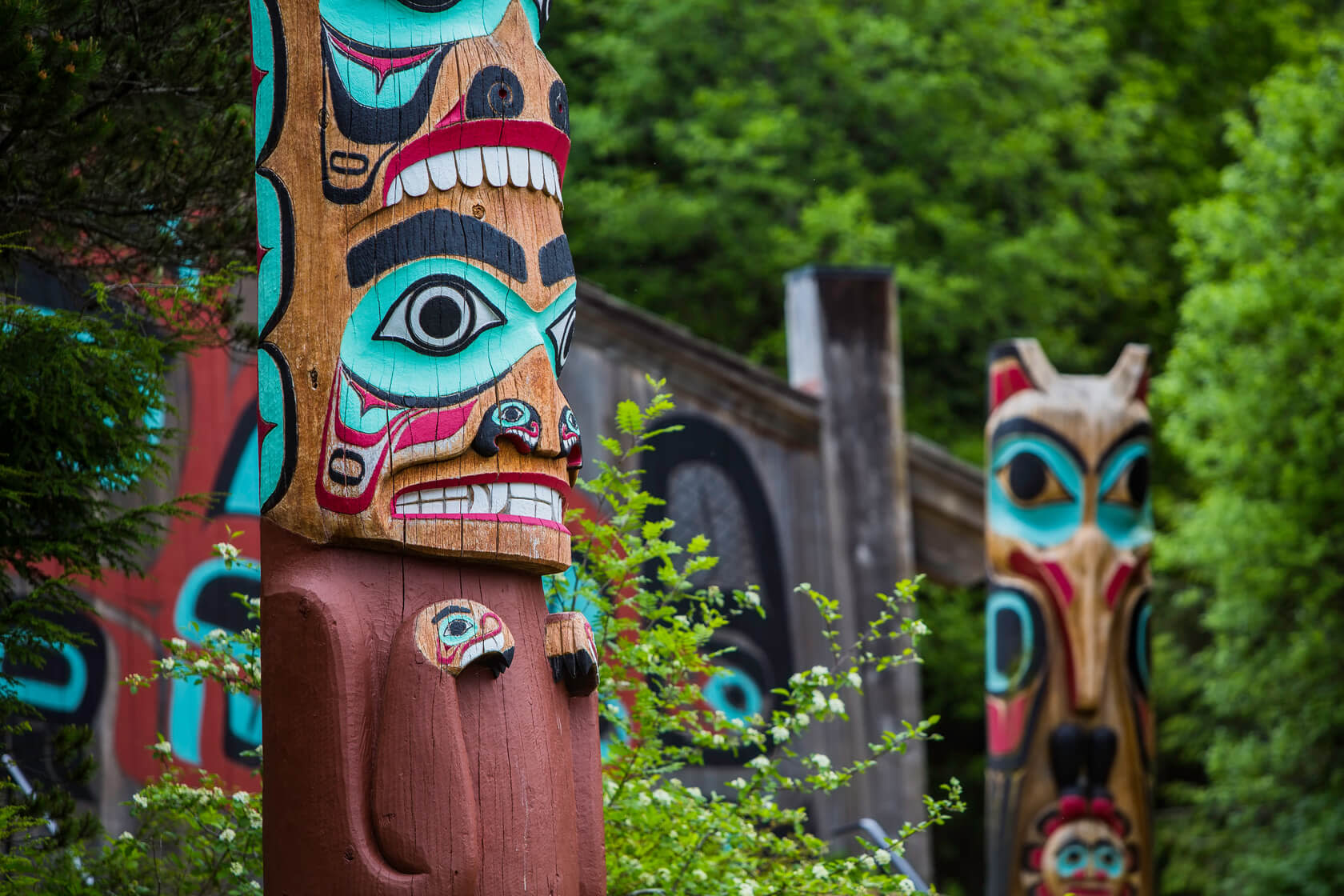 detail of totem pole at saxman village tribal house near