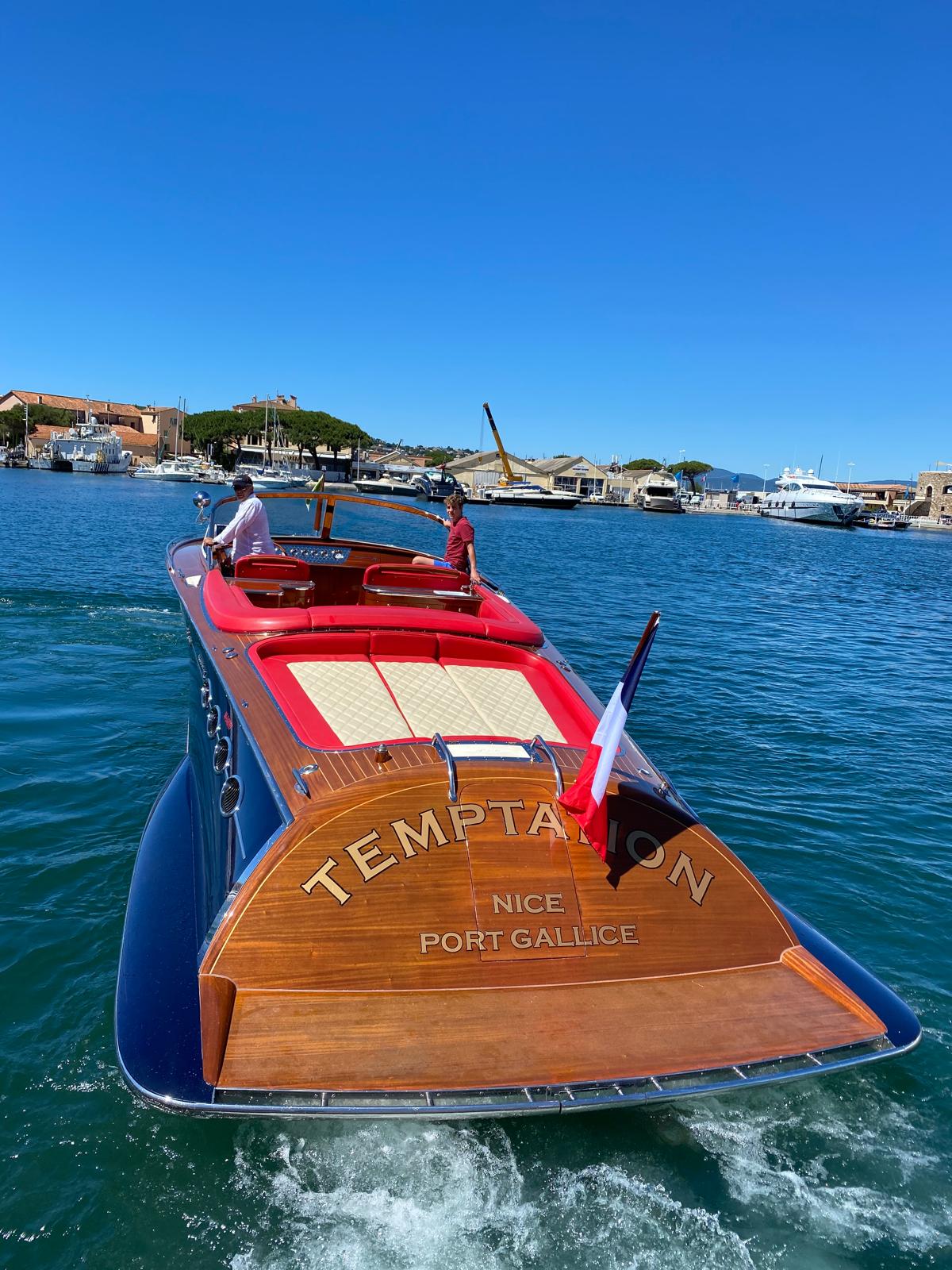 Temptation heads out of harbour.
