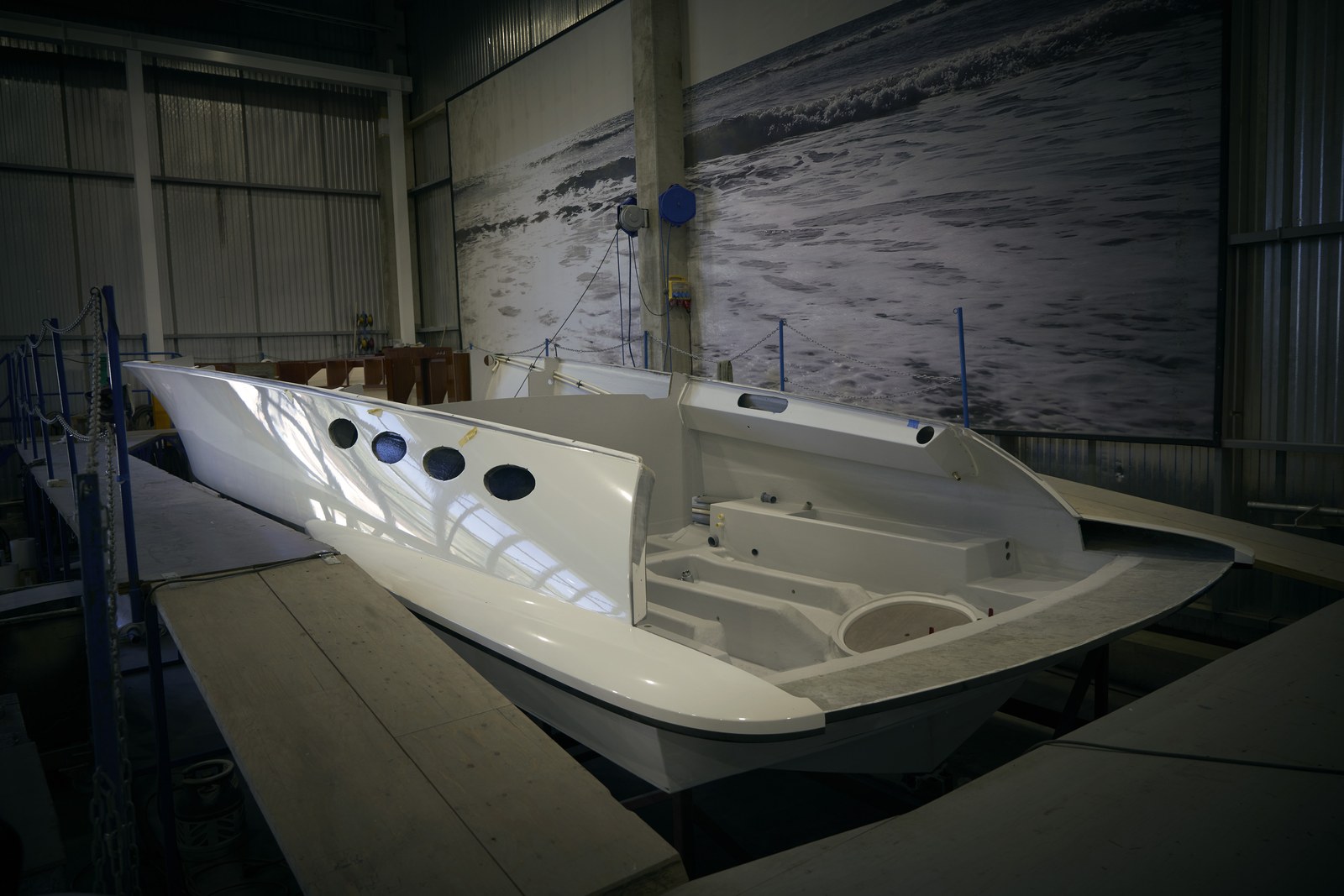 A composite J Craft Torpedo hull in the Visby workshop.