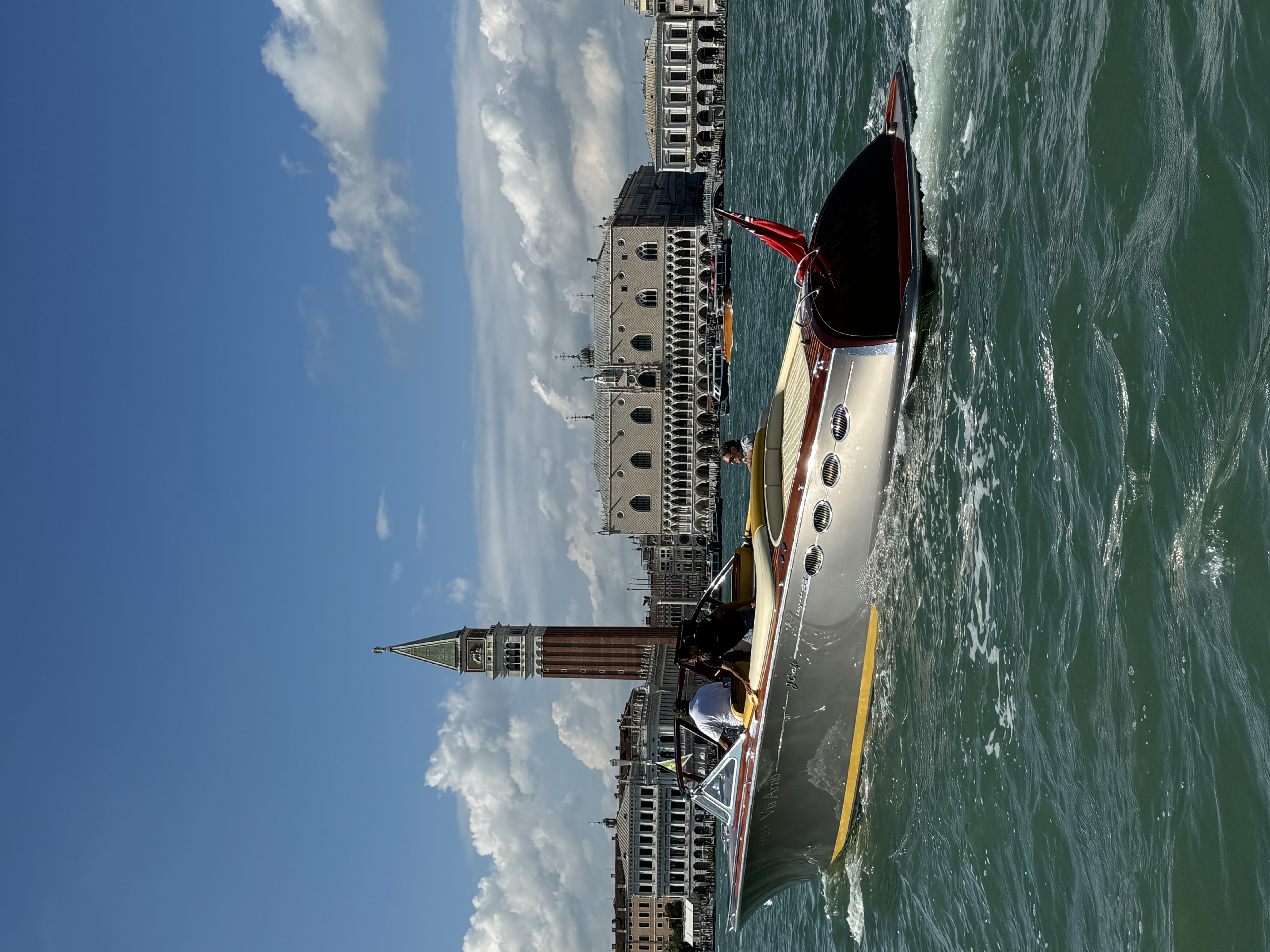 J Craft Torpedo gliding through the Venetian lagoon with St Mark's Campanile in the background