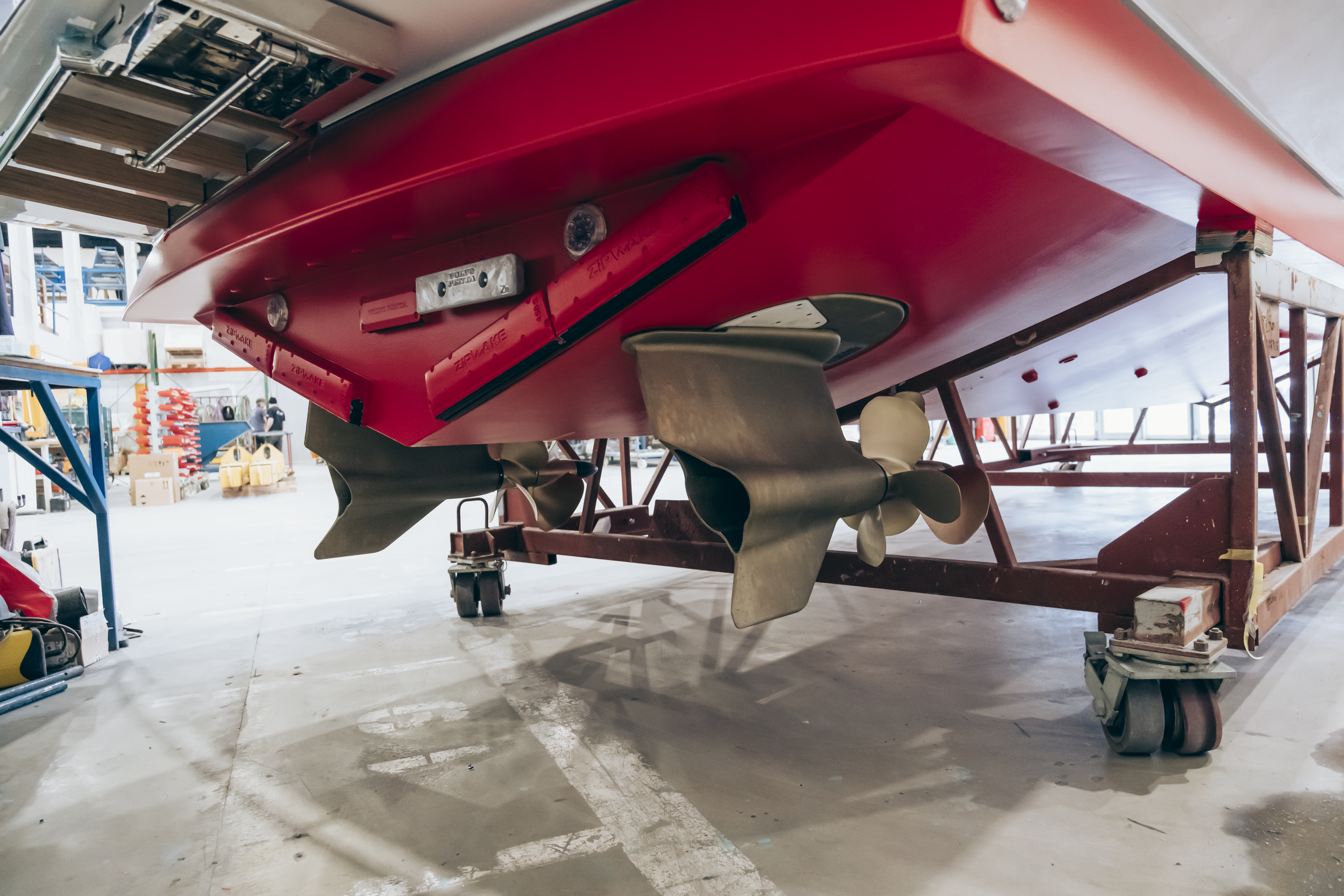 J Craft Torpedo hull underside showing twin propellers and Zipwake dynamic trim tabs