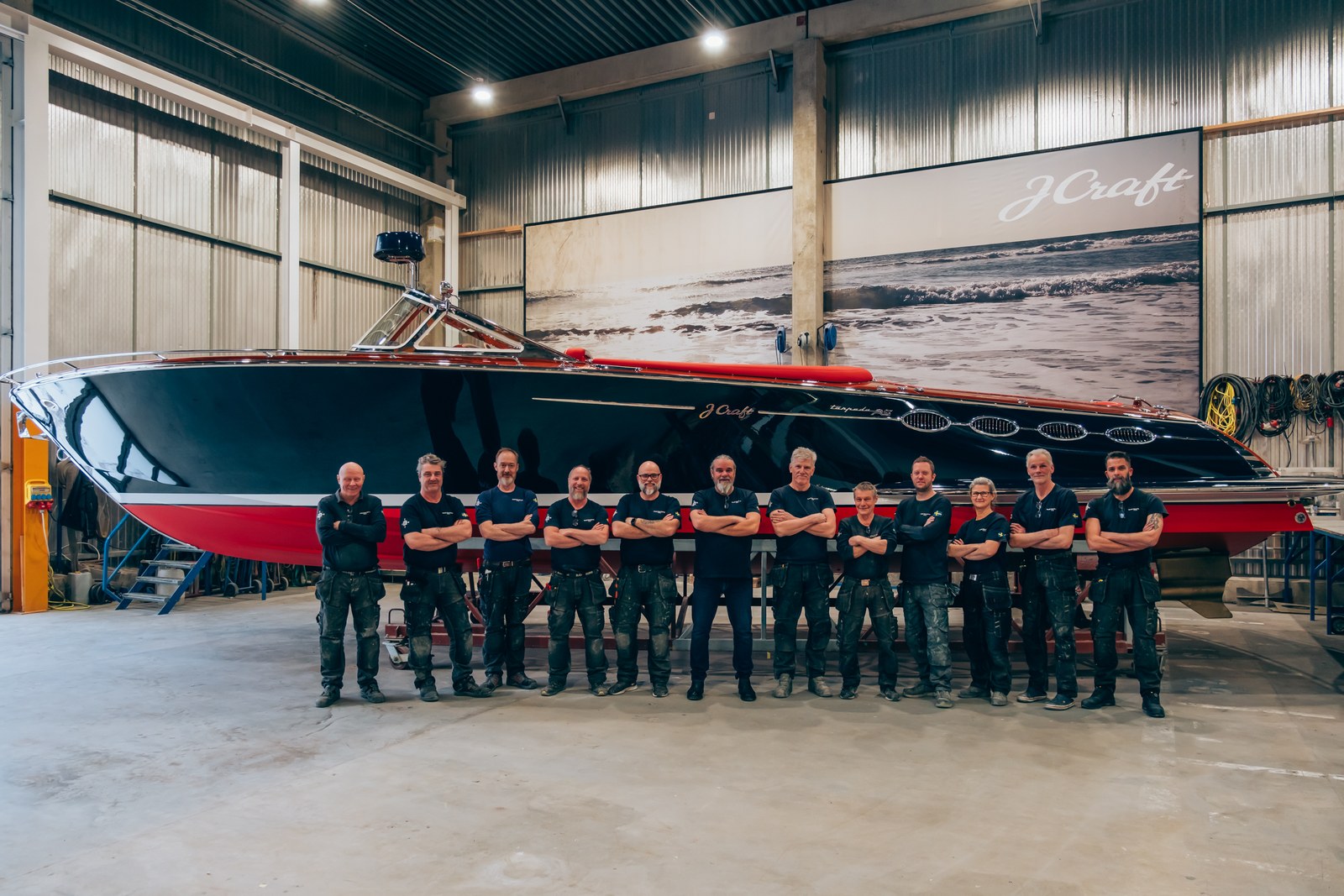 The J Craft team in Visby with Torpedo Aquila in the workshop.