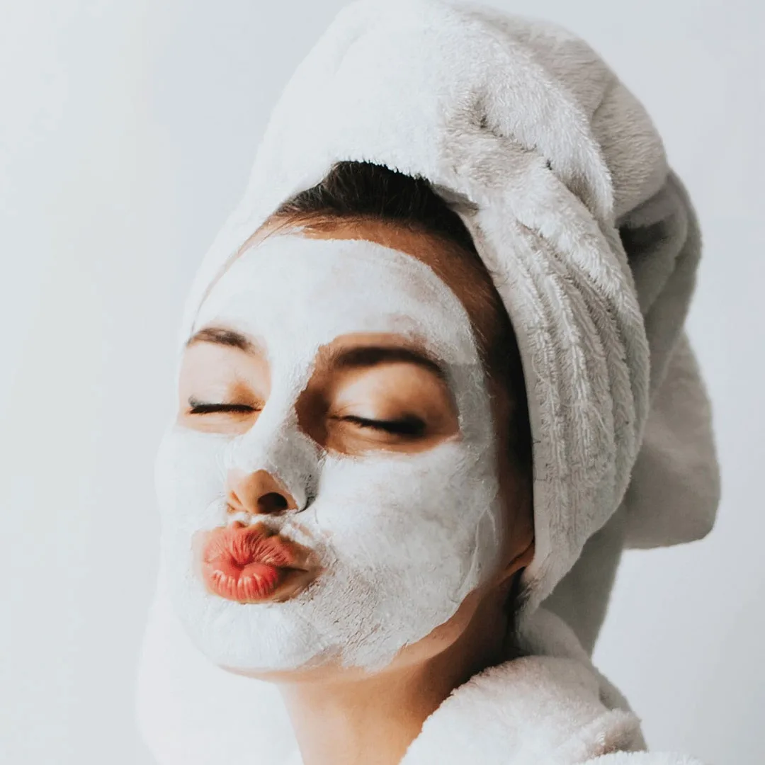 A photo of a woman in towel