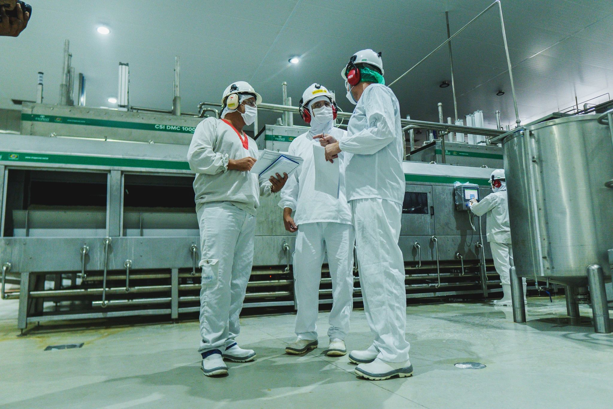 employes talking in a factory