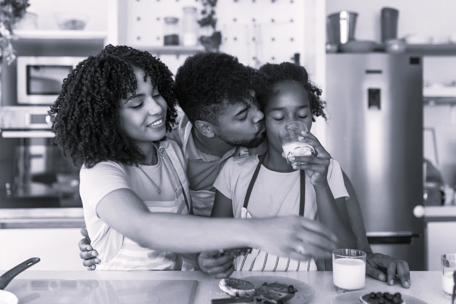 a family drinking milk