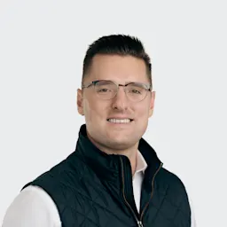 A professional headshot of Sean Kelly.