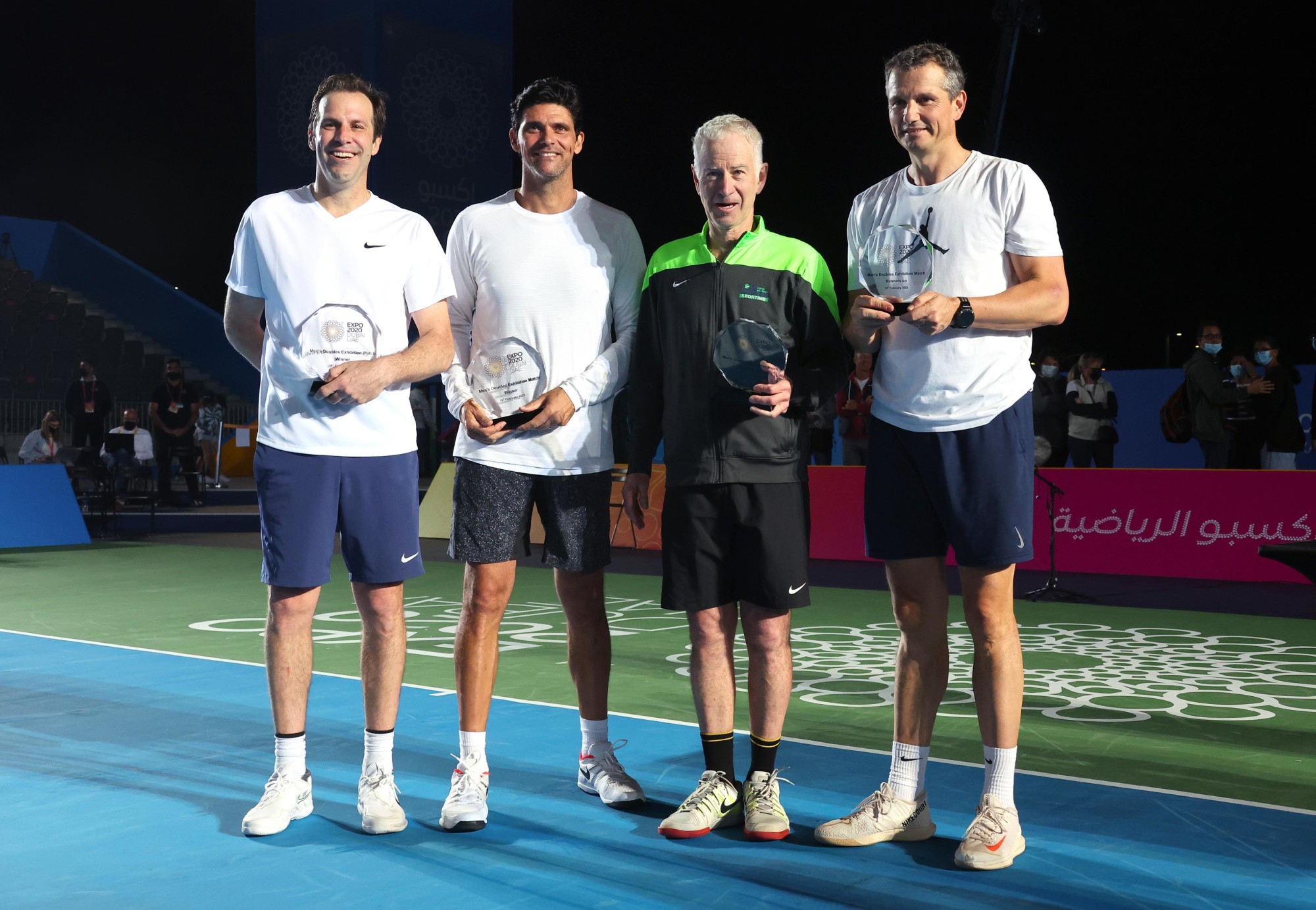 Men’s Doubles Exhibition Game winners and tennis legends Mark Philippoussis (L2) and Greg Rusedski (L1) alongside runners up John McEnroe (R2) and Richard Krajicek (R1) with their awards during Expo 2020 Dubai Tennis Week at the Expo Sport