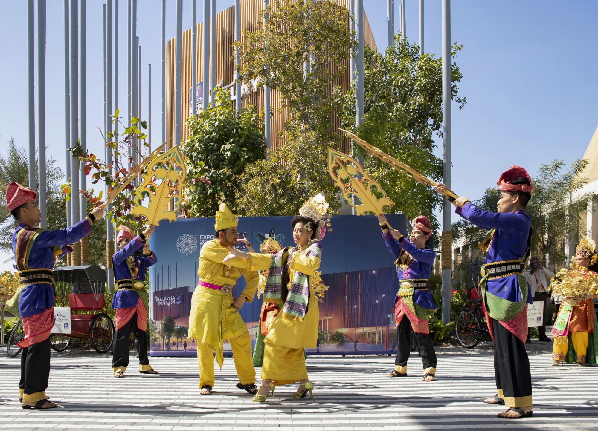 Performers outside the Malaysia Pavilion as part of the Queen-s Baton Relay event during the United Kingdom National Day celebrations m46416