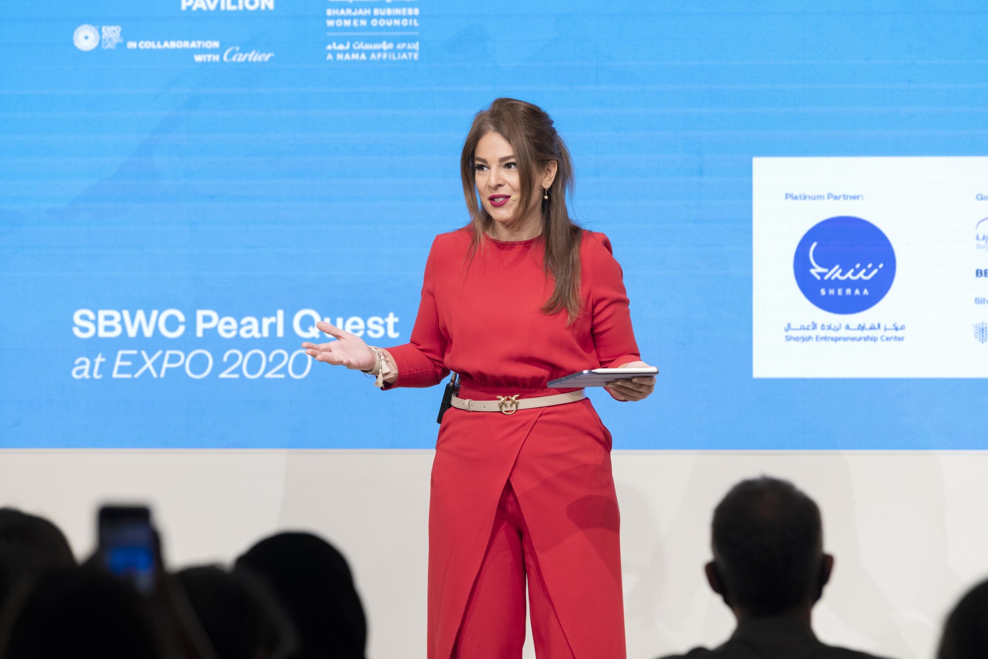 Jessy El Murr, Senior Journalist and host speaks during the Outlier Series - Pearl Quest by Sharjah Business Women Council at the Women’s Pavilion m45242