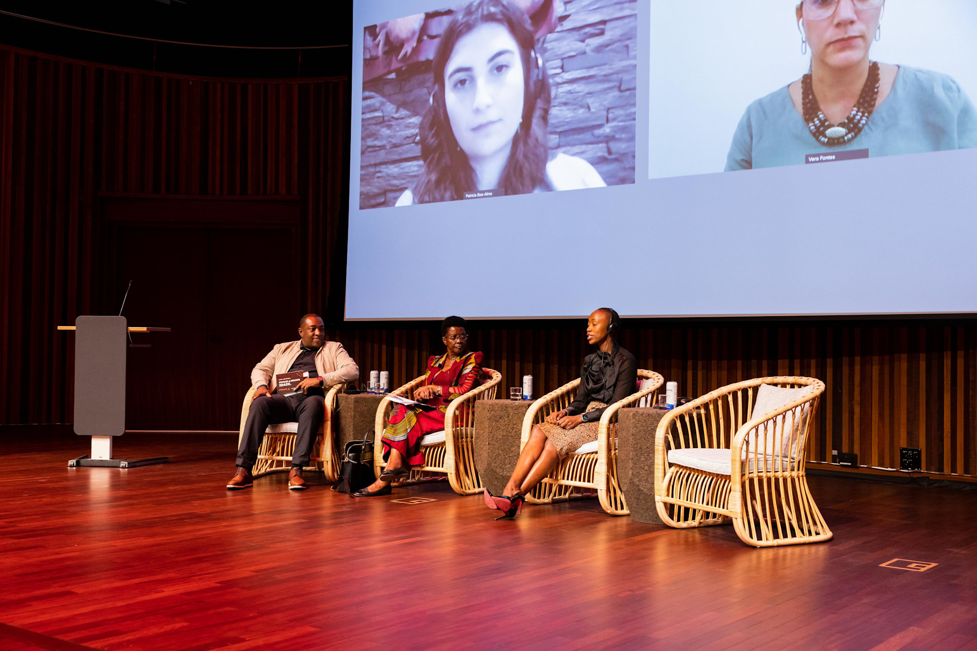 Dr Patricia Boa-Alma (virtual L), Dr Vera Fontes (virtual R), Daniel Nascimento ((L), Dr Deolinda Bebiana de Almcida (C) and Miss Abigael Wanjiru (R) during the Pensar a Melhor Idade Thinking about the best age panel discussion at Terra