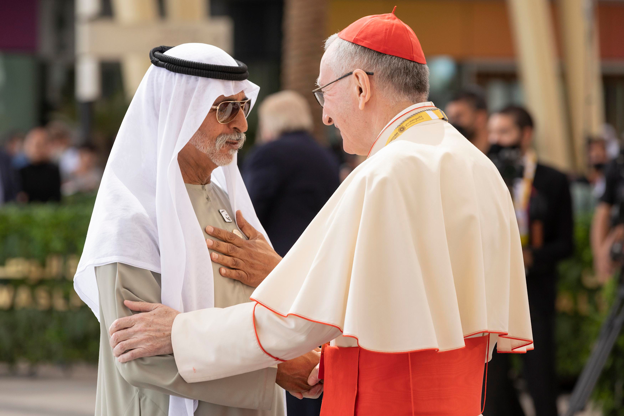 His Eminence Cardinal Pietro Parolin (R), Secretary of State of His Holiness hands shake with His Excellency Sheikh Nahayan Mabarak Al Nahayan (L), UAE Minister of Tolerance and Coexistence Commissioner General of Expo 2020 Dubai during the