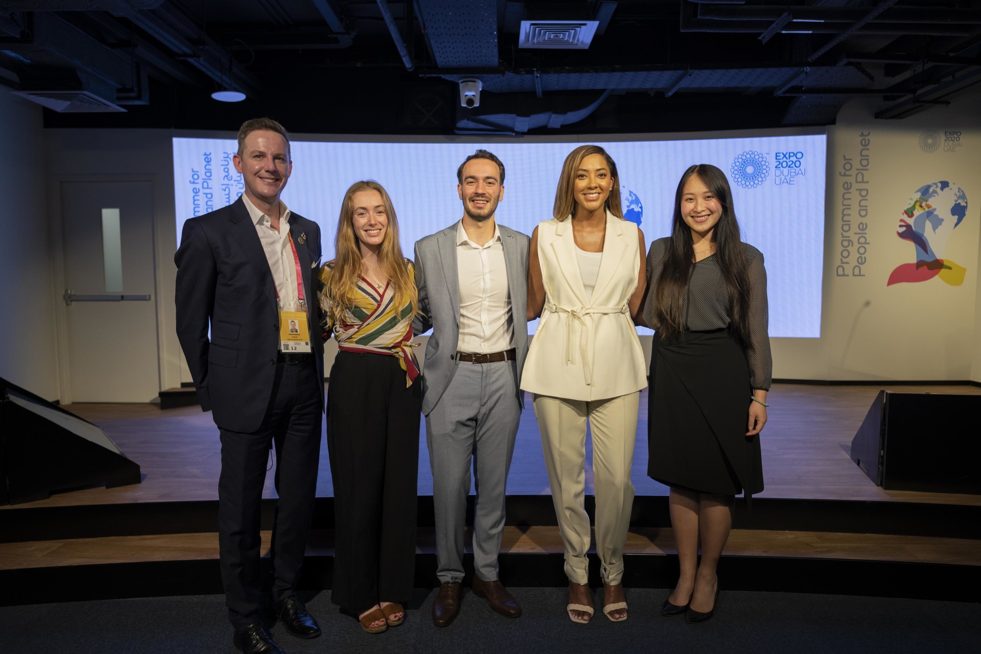 A group photo with Dr Joanna Abeyie MBE (R2), Founder of Blue Moon Consulting, spotlighting innovative solution speaks at the Closing the Digital Divide talk at Nexus for People and Planet m31035