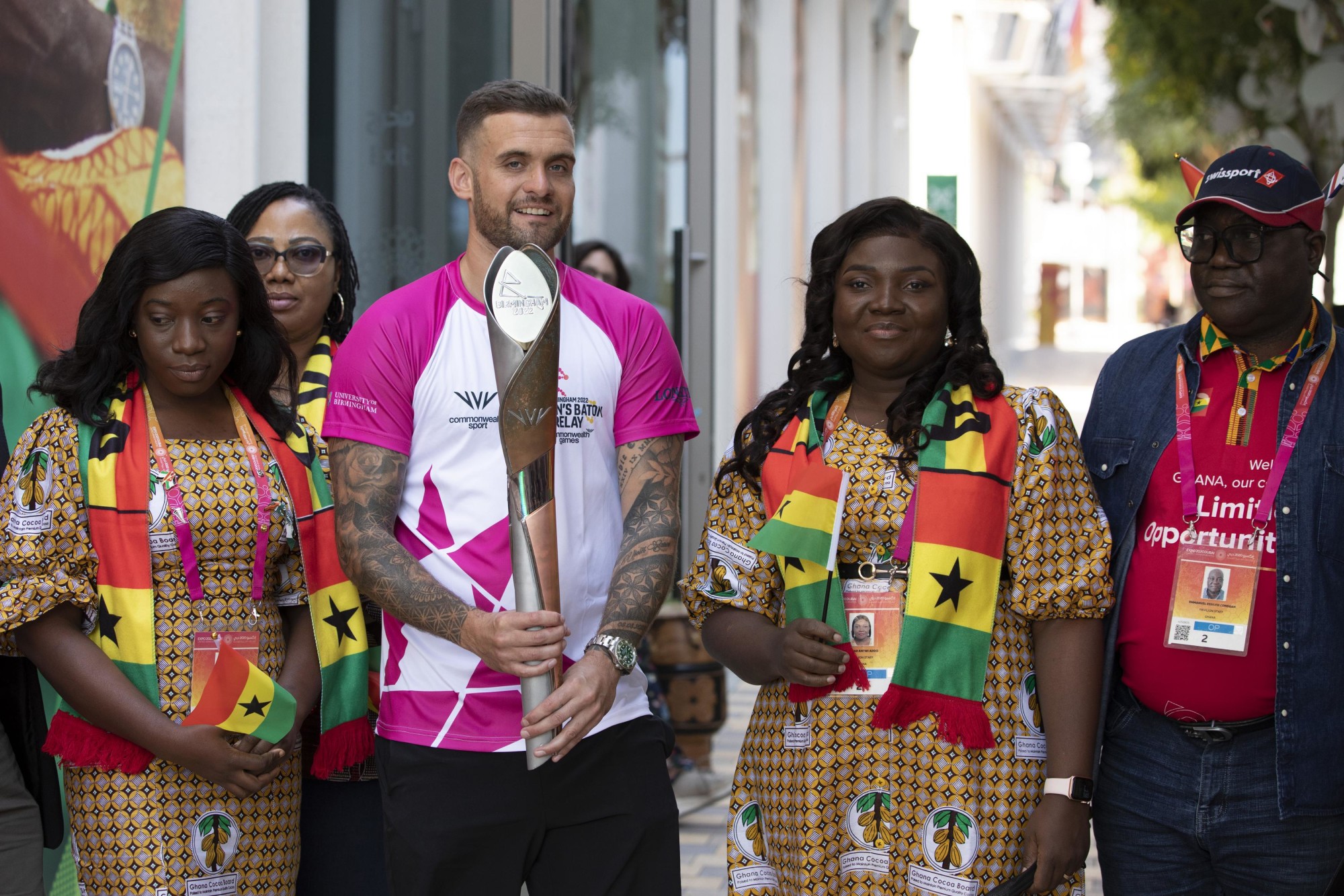 Glen Clifton (L2), Chief Petty Officer Baton Bearer at the Queen-s Baton Relay event outside the Ghana Pavilion during the United Kingdom National Day celebrations m46361