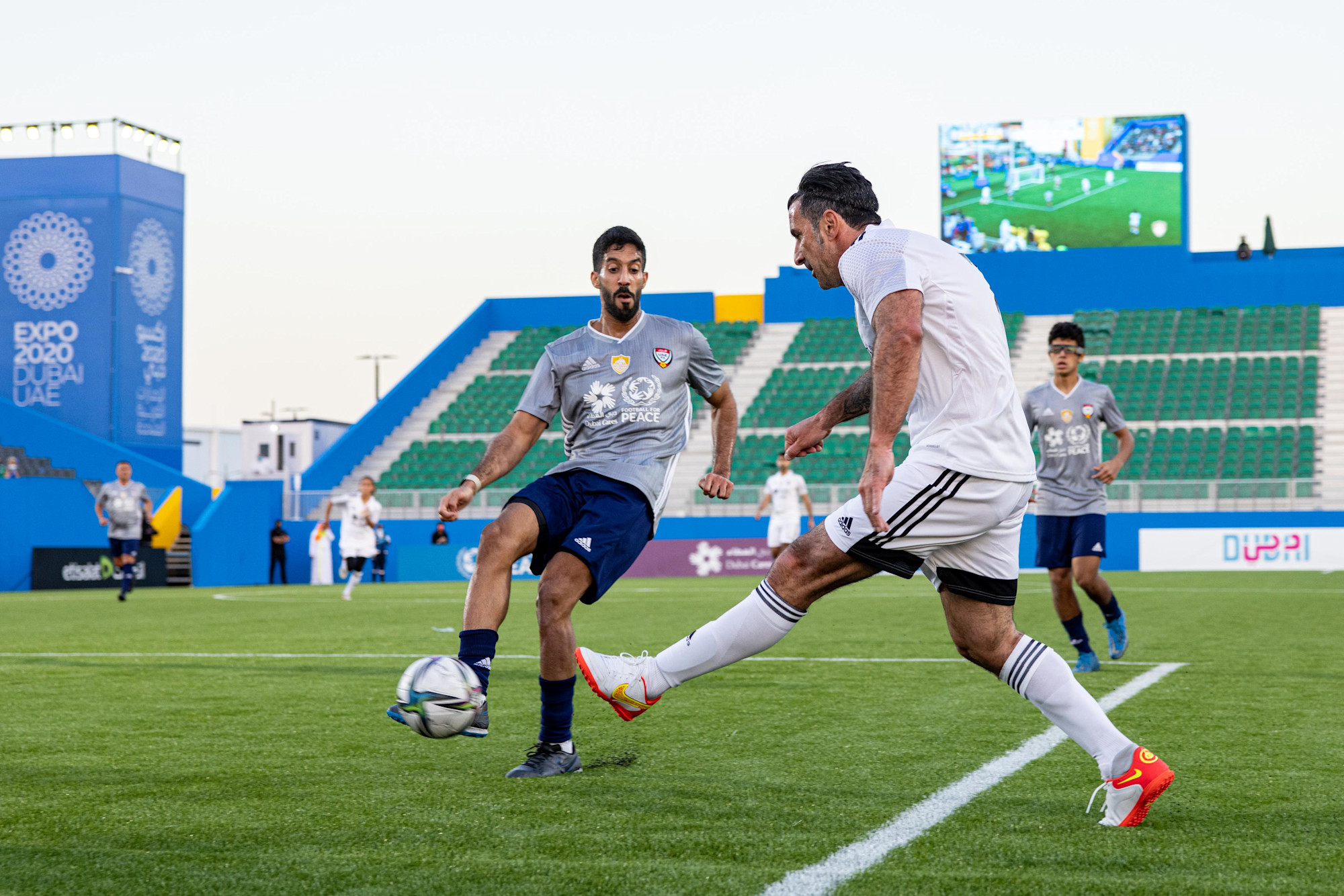 Luis Figo (C), of Team Salgado in action during the UAE All Stars Football tournament at the Expo Sports Arena m30759