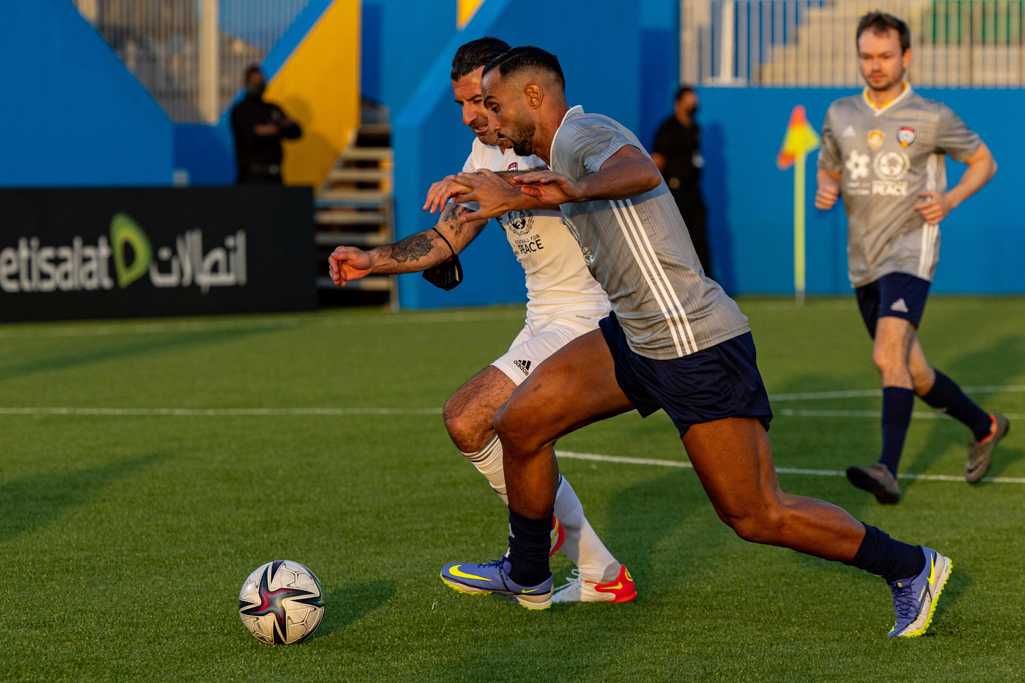 Luis Figo (L), of Team Salgado in action during the UAE All Stars Football tournament at the Expo Sports Arena m30734