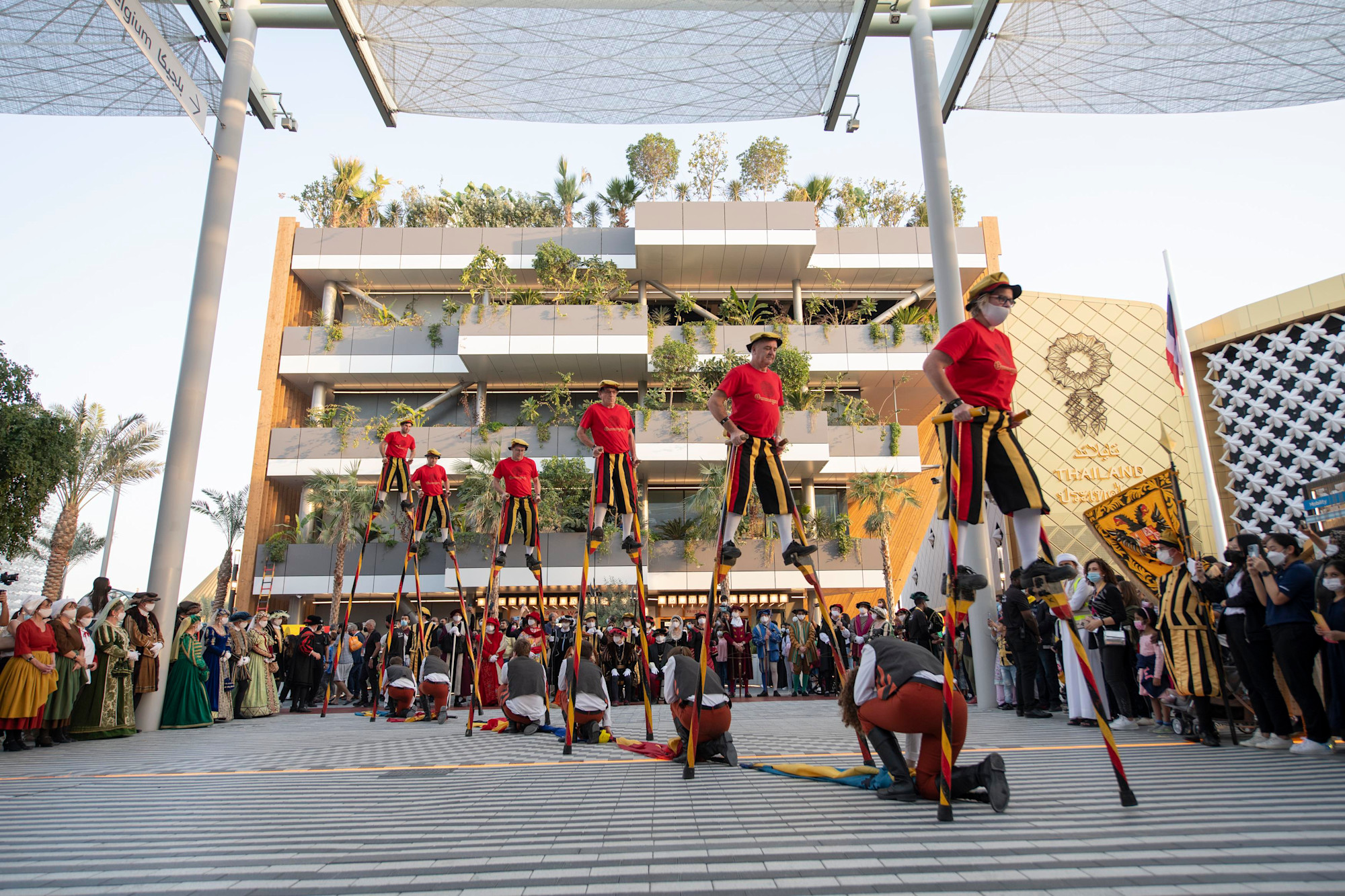 Ommegang performers outside the Belgium Pavilion during Belgium National Day m43781