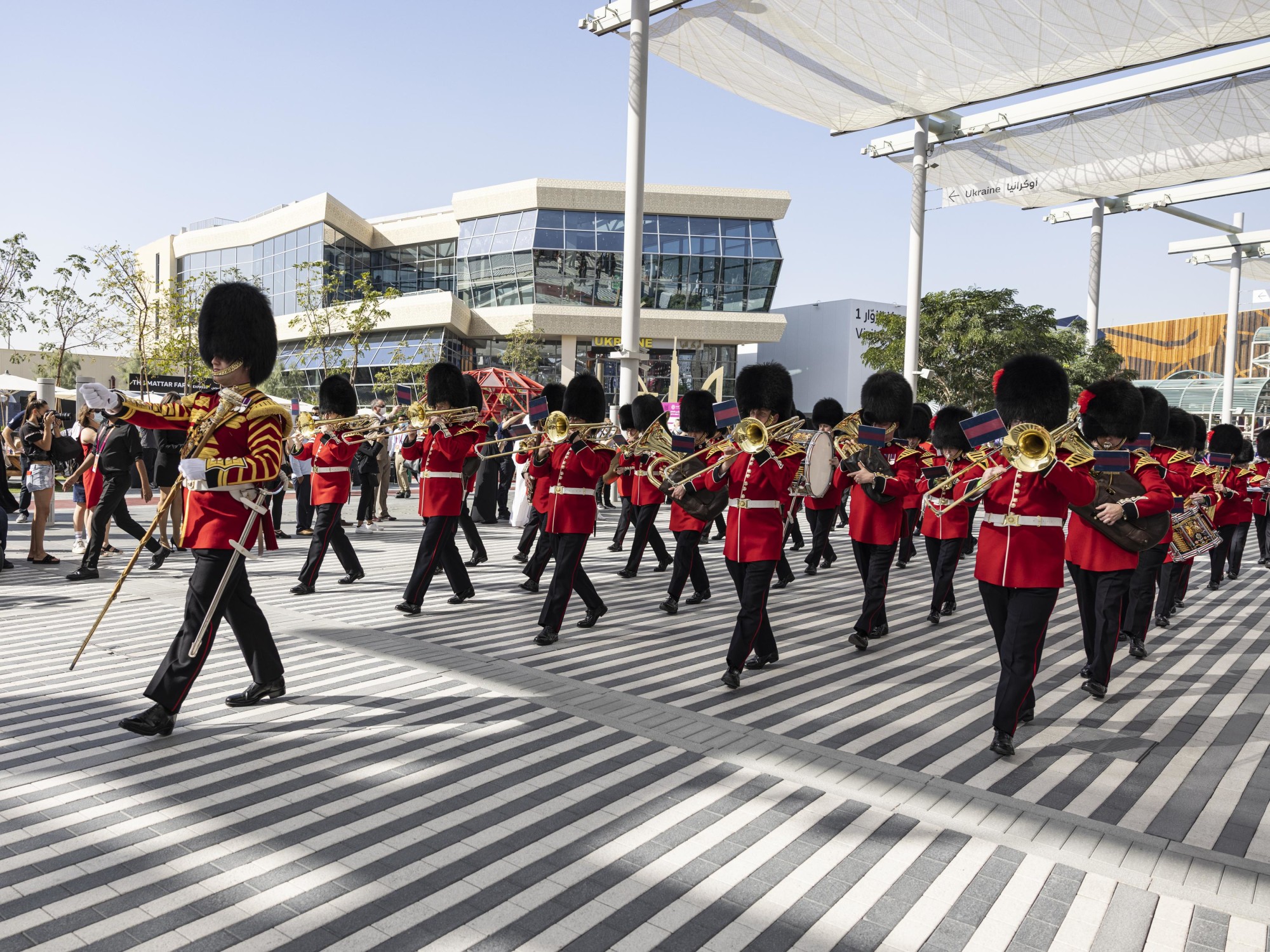 The Coldstream Guards parade past the United Kingdom Pavilion during the United Kingdom National Day Celebrations m46332