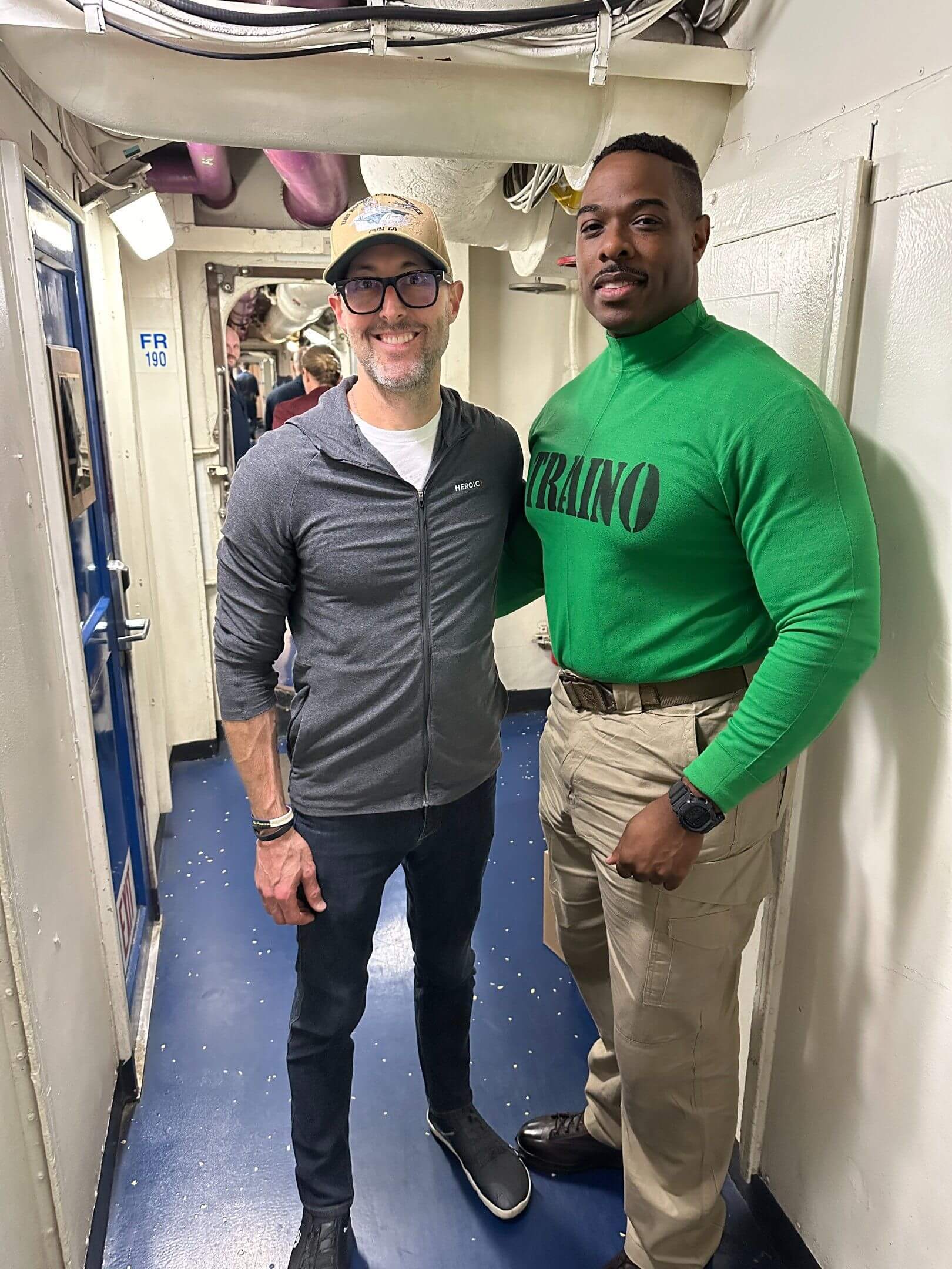 a photo of Brian with LCDR Jason McClinton who goes by TRAINO 