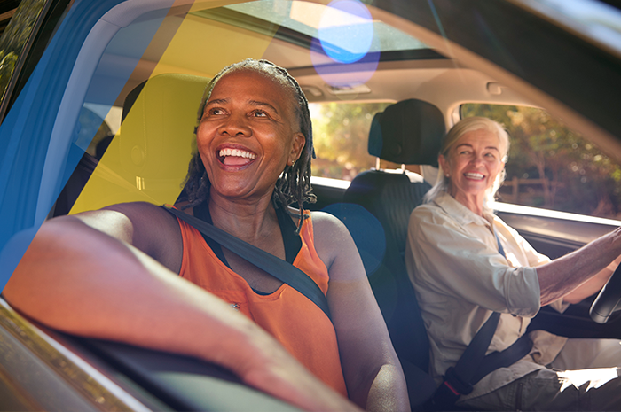 Two women driving in a car