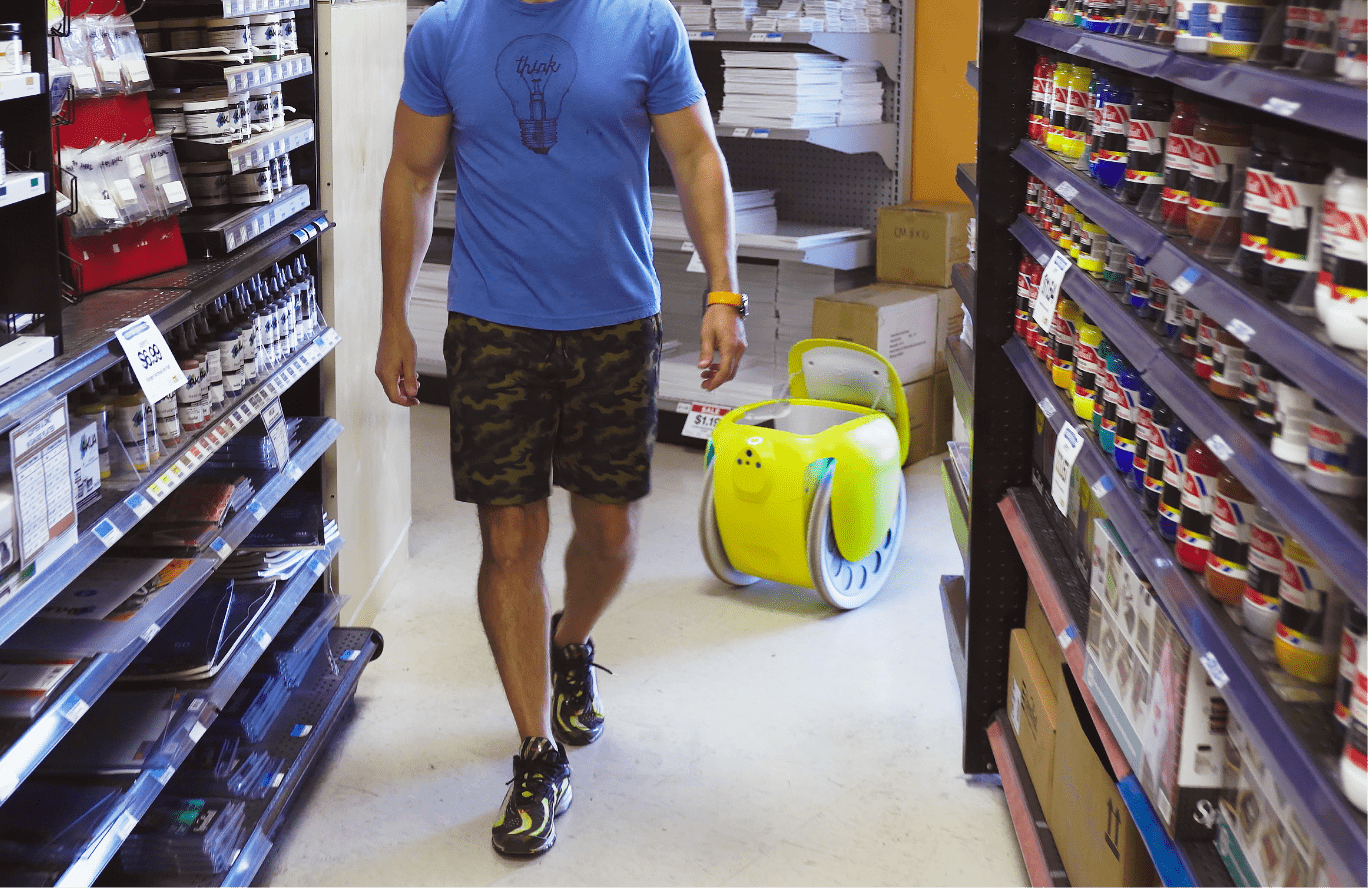 robot following person in a store