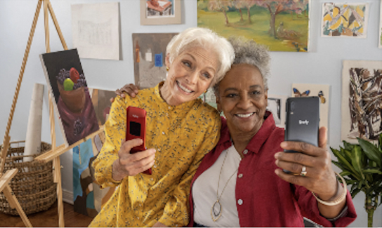 Two friends with Jitterbug phones