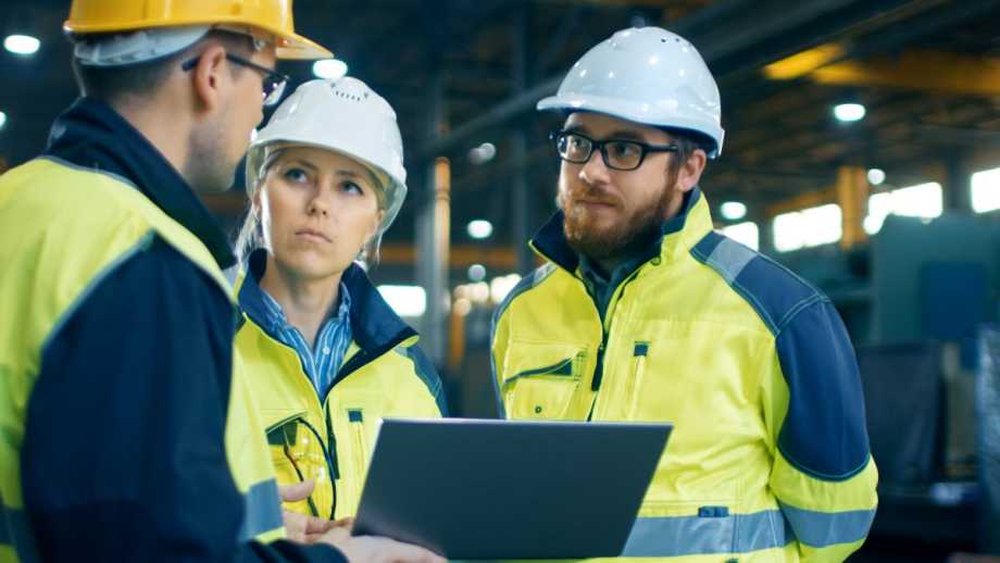 Construction managers on site PPE