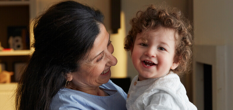 grandma holding baby