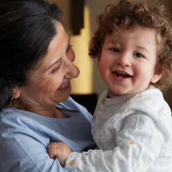 grandma holding baby