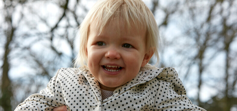 toddler smiling park