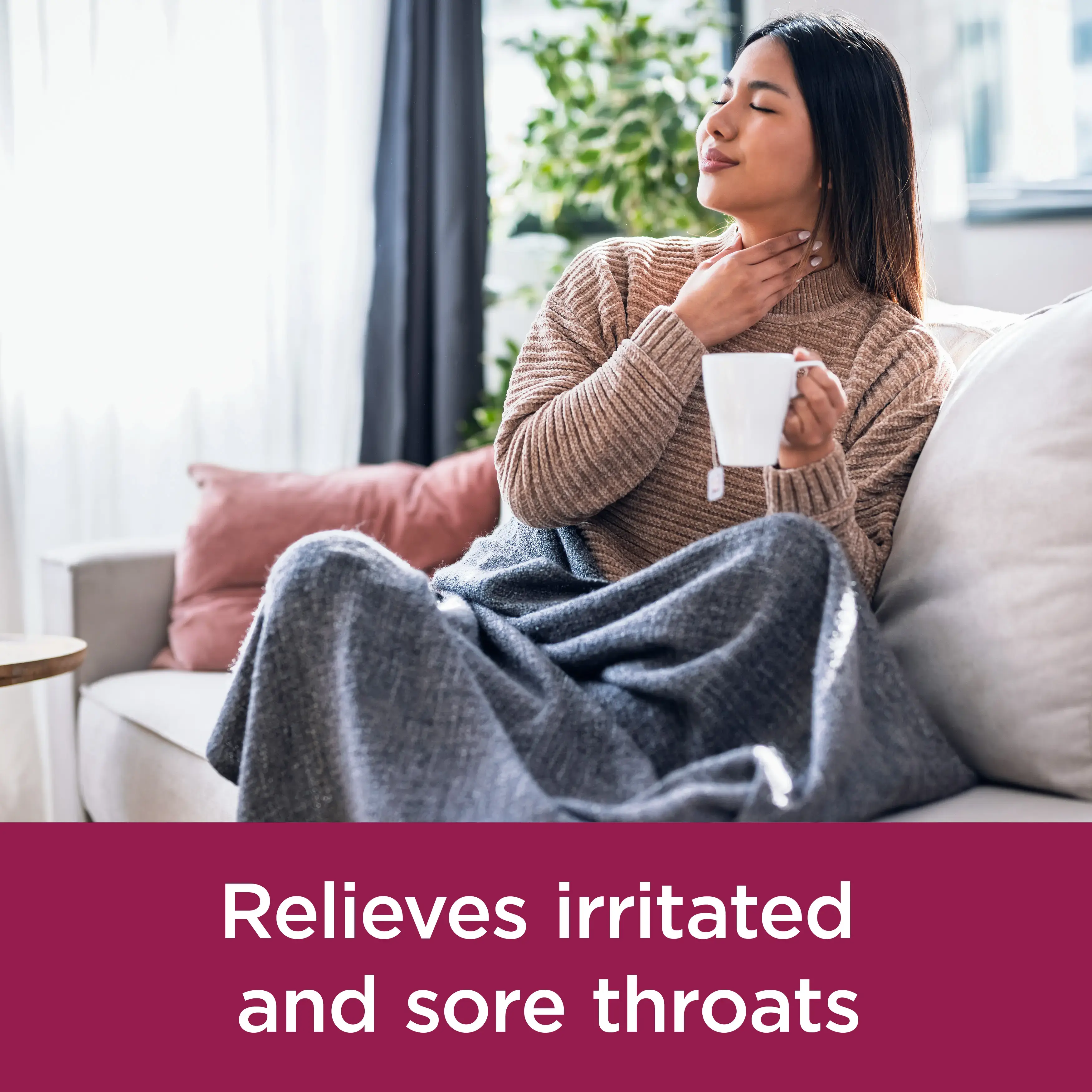 Image showing a woman with her hand on the throat and in the other had carrying a tea cup with the claim: Relieves irritated and sore throats