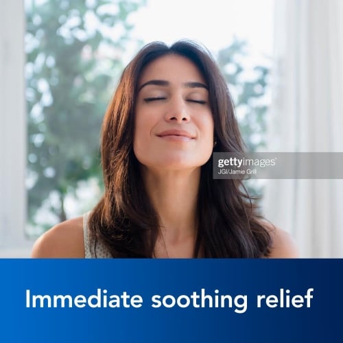 Image of a women and the caption: Immediate soothing relief referring to Benylin's Dry Coughs Syrup