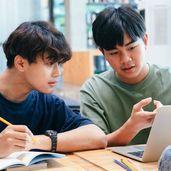 Two students at a computer
