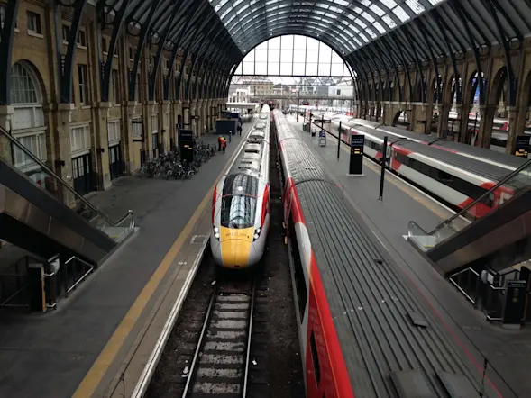 An image of trains at a train station