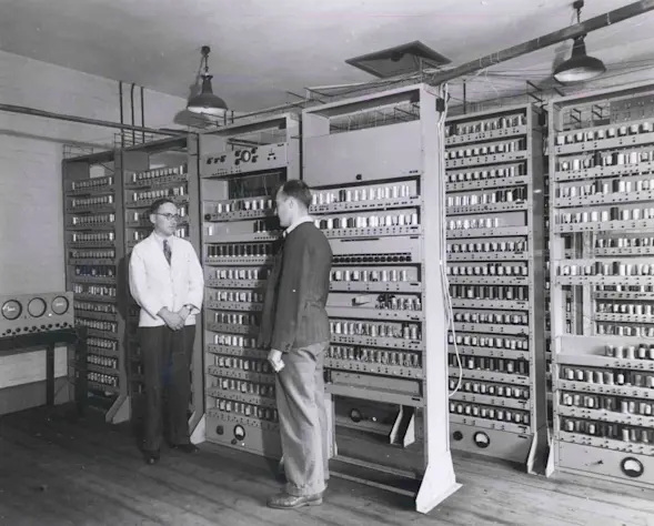 Maurice Wilkes and Bill Renwick in front of the complete EDSAC.