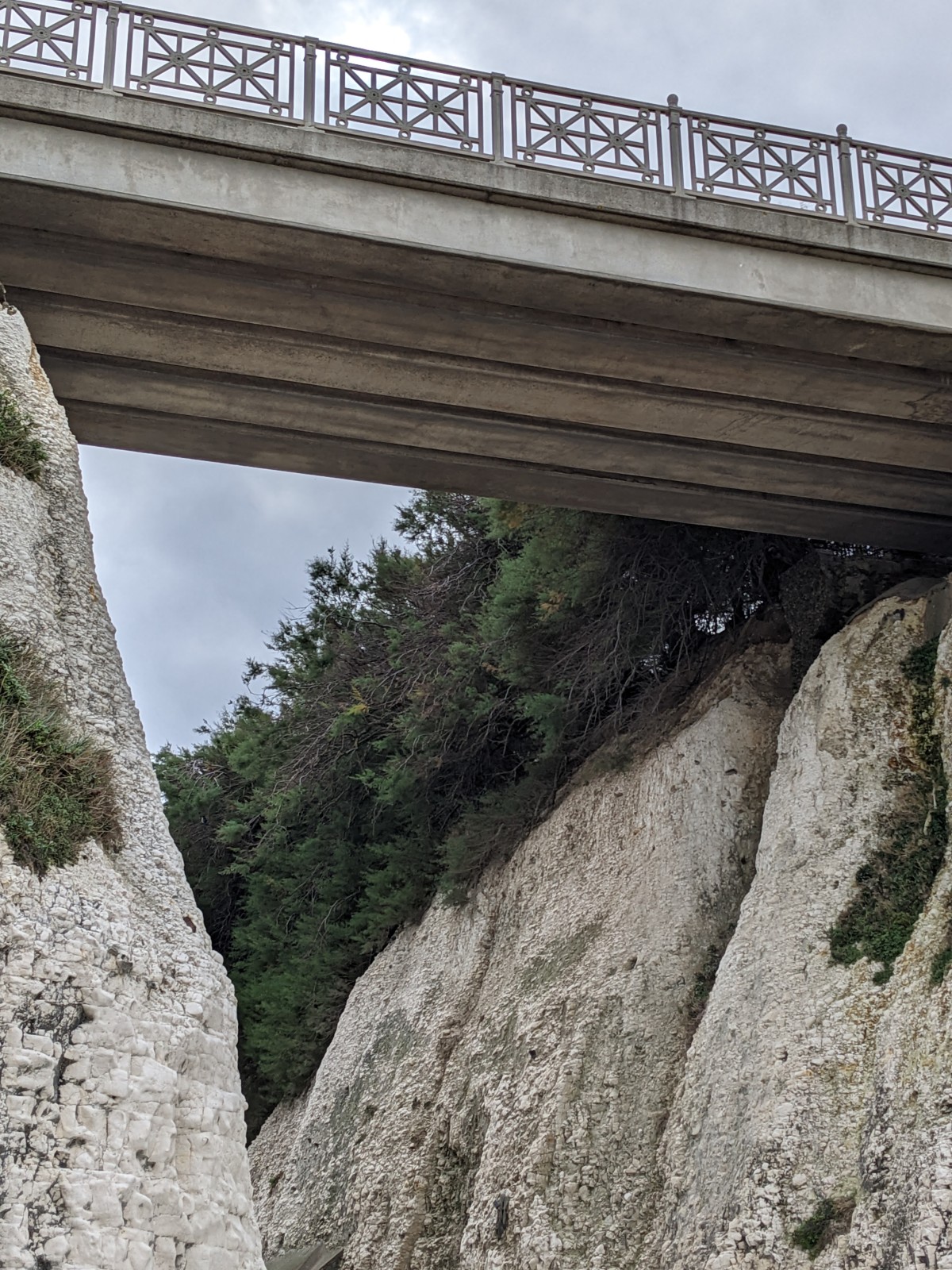 Close up of a bridge spanning 2 large cliff-faces