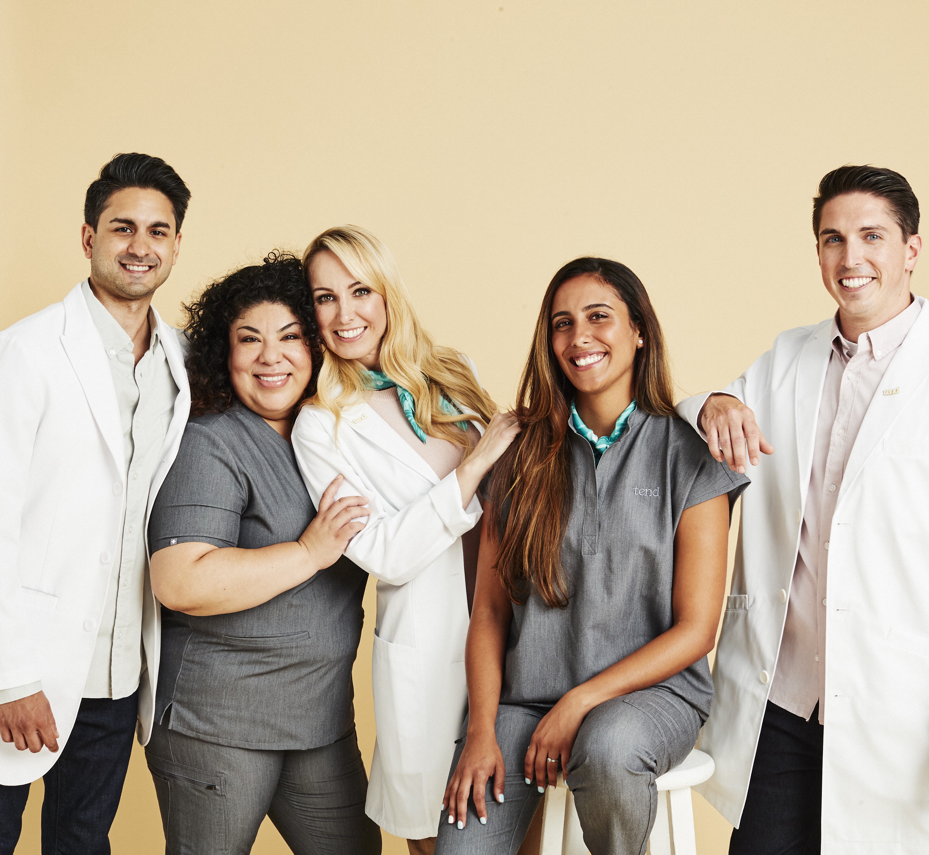 group photo of smiling Tend hygienists and dentists