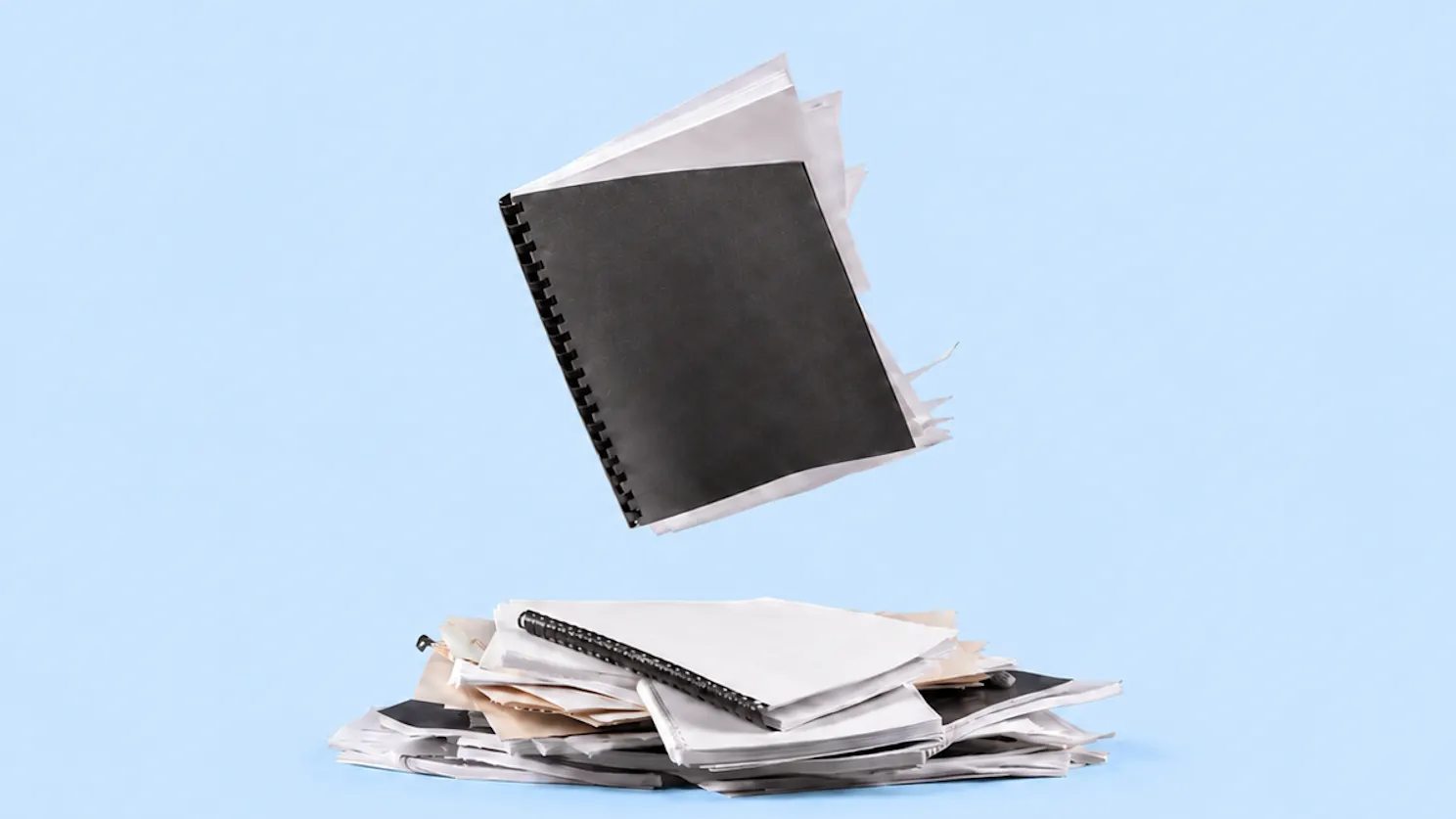 260804_joni_rutter_report_paper_pile_of_reports_16x9