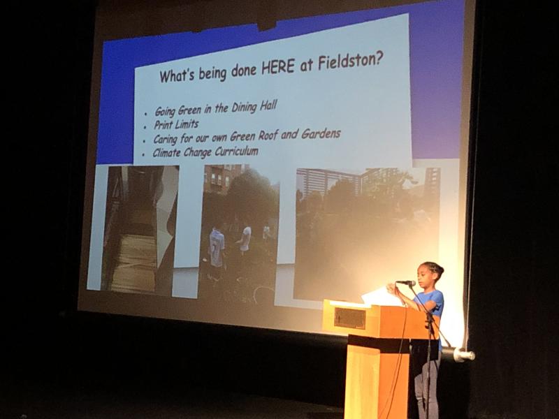 A student presents at Fieldston Middle School Town Hall on Climate Change 