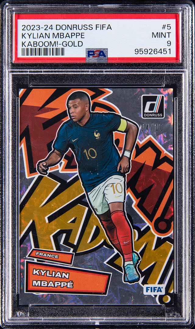 Mbappé 2023-24 Kaboom Gold /10 PSA 9 sells for $18.9K