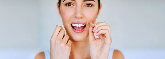 Zalety czyszczenia zębów nicią dentystyczną